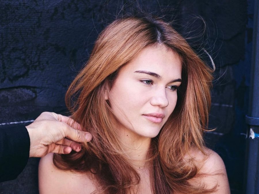 A finished blowout with volume and movement, styled on location